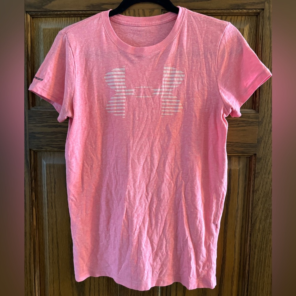 Pink Under Armour shirt with logo on front